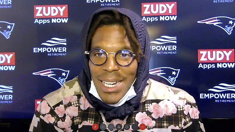 In this still image from a Webex media availability hosted by the Patriots, quarterback Cam Newton responds to a question Friday in Foxborough, Mass.