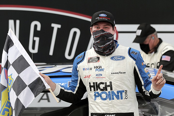 In this Thursday, May 21, 2020, file photo, Chase Briscoe celebrates after winning the NASCAR Xfinity series auto race in Darlington, S.C. Briscoe is very clear about his goal of earning a promotion to NASCAR's top Cup Series. He's made his case this season with an Xfinity Series-leading five victories with an eye on adding another win Saturday on the road course at Road America. (AP Photo/Brynn Anderson, File)