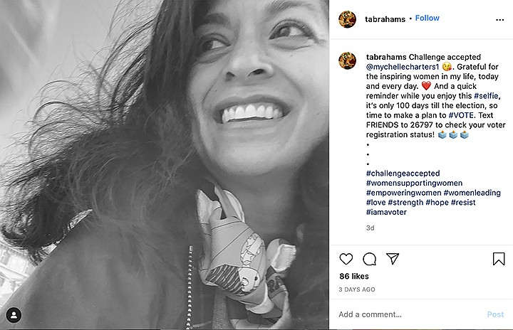 This image provided by Tara Abrahams shows her Instagram post with the #challengeaccepted joining female users across the United States, flooding the photo-sharing app with black-and-white images. The official goal: a show of support for other women. Abrahams, the philanthropic advisor from New York added a caption encouraging people to check their voter registration status and make a plan to vote in November. (Tara Abrahams via AP)