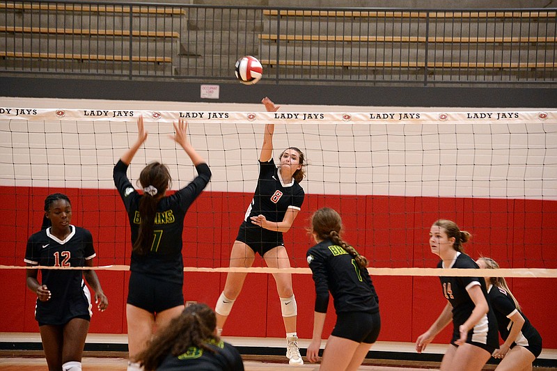 Annabelle Maasen of Jefferson City hits the ball during a volleyball match against Rock Bridge last season at Fleming Fieldhouse.