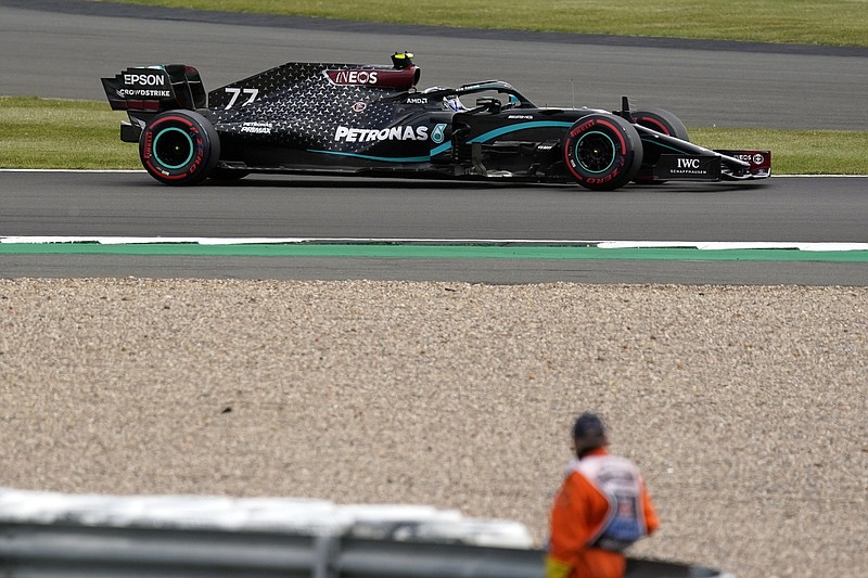 Mercedes driver Valtteri Bottas steers his car Saturday during qualifying for the 70th Anniversary Formula One Grand Prix in Silverstone, England.