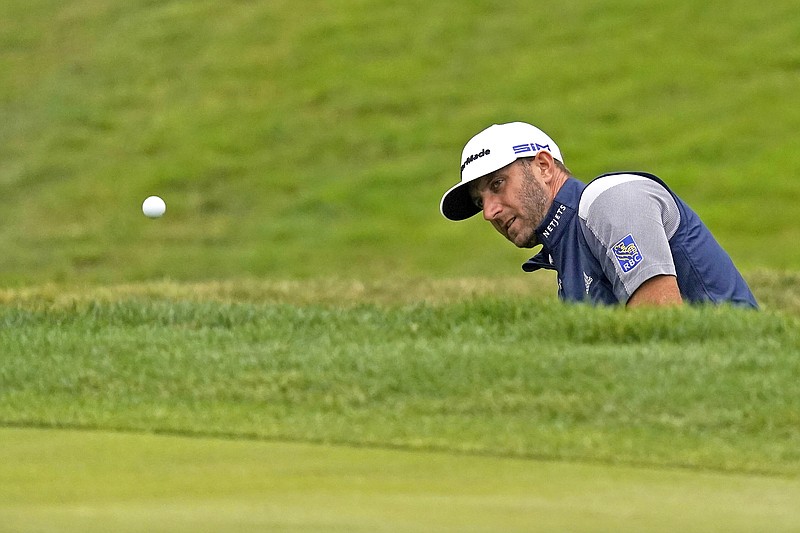 Dustin Johnson hits from the bunker on the eighth hole during Sunday's final round of the PGA Championship at TPC Harding Park in San Francisco.