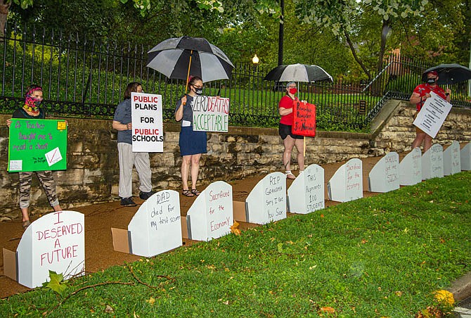 Missourians for Educational Change protest Monday outside the Governor's Mansion ahead of a Tuesday meeting discussing the reopening of schools.