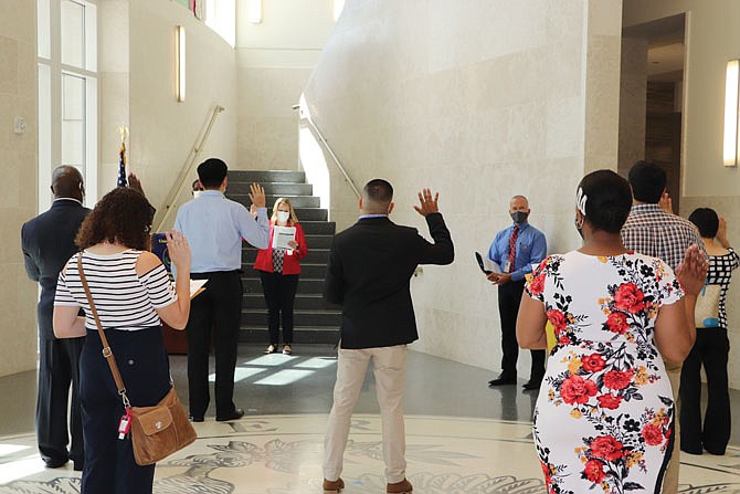 Ten people from eight countries took their Oath of Allegiance to the United States during a naturalization ceremony Monday at the U.S. District Courthouse in Jefferson City.