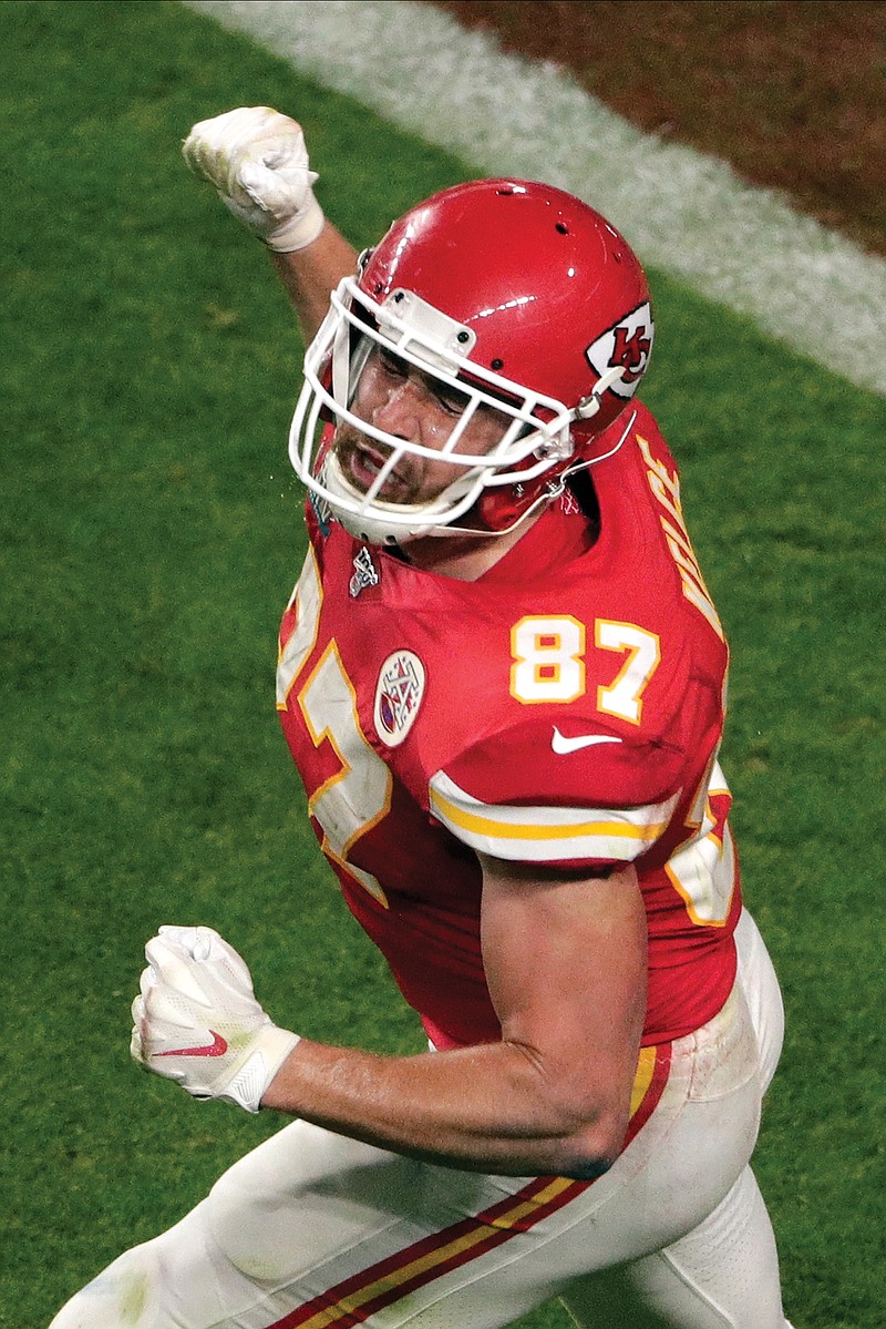 In this Feb. 2 file photo, Chiefs tight end Travis Kelce celebrates after scoring a touchdown during the second half of Super Bowl 54 in Miami Gardens, Fla. Kelce has reportedly agreed to a four-year contract extension with the Chiefs.