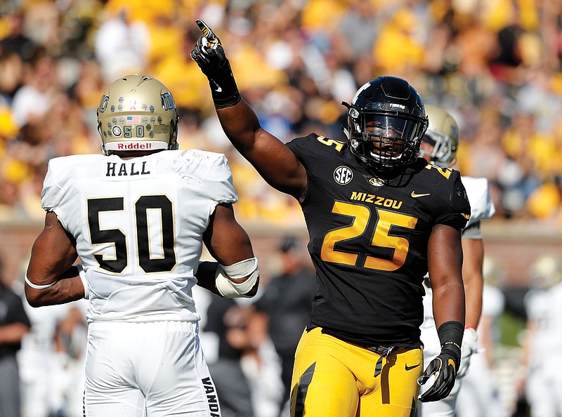In this Oct. 21, 2017, file photo, Missouri linebacker Jamal Brooks celebrates along side Idaho linebacker Ed Hall during a game at Faurot Field in Columbia.