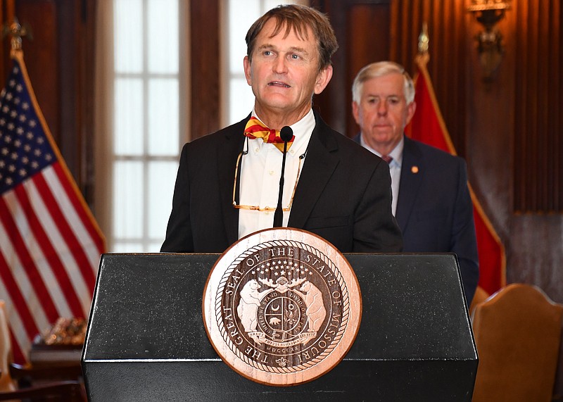 Missouri Department of Health and Senior Services Director Dr. Randall Williams speaks during a COVID-19 briefing Tuesday, Aug. 18, 2020, as Gov. Mike Parson looks on. (Courtesy of Parson's office)