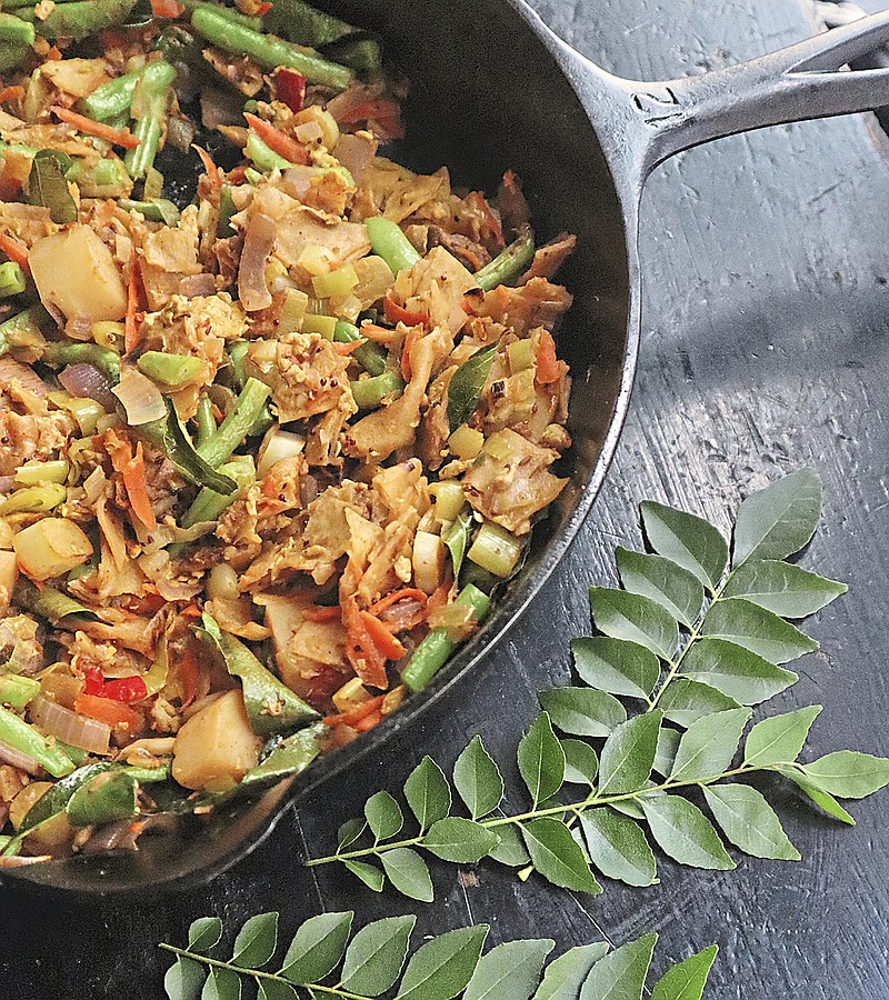This Sri Lankan stir-fry is made with roti, fresh veggies and leftover beef curry. It's a popular street food. (Gretchen McKay/Pittsburgh Post-Gazette/TNS)