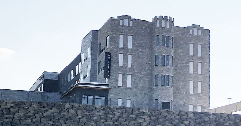 <p>Courtyard by Marriott currently under construction. Farmer’s Holding Group preserved many stones from the original St. Mary’s hospital in the construction of the north face of their hotel on the site of the original hospital.</p>