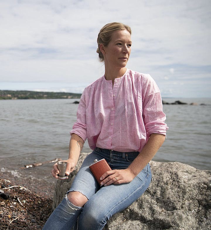 Emily Vikre poses for a portrait on the shore of Lake Superior in Duluth, Monday, as she demonstrated how to make an Old Fashioned. (Alex Kormann/Minneapolis Star Tribune/TNS)