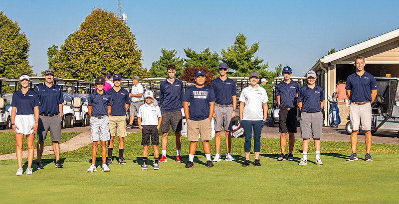 Levi Elder (right) and his Wanted Golf members and coaches before the 4-man fundraising tournament at Oak Hills Golf Course Saturday morning.  (Ken Barnes/News Tribune)