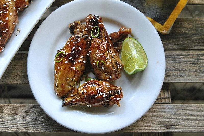 Baked Cherry and Balsamic Glazed Wings will spice up any tailgate party.
(Gretchen McKay/Pittsburgh Post-Gazette/TNS) 