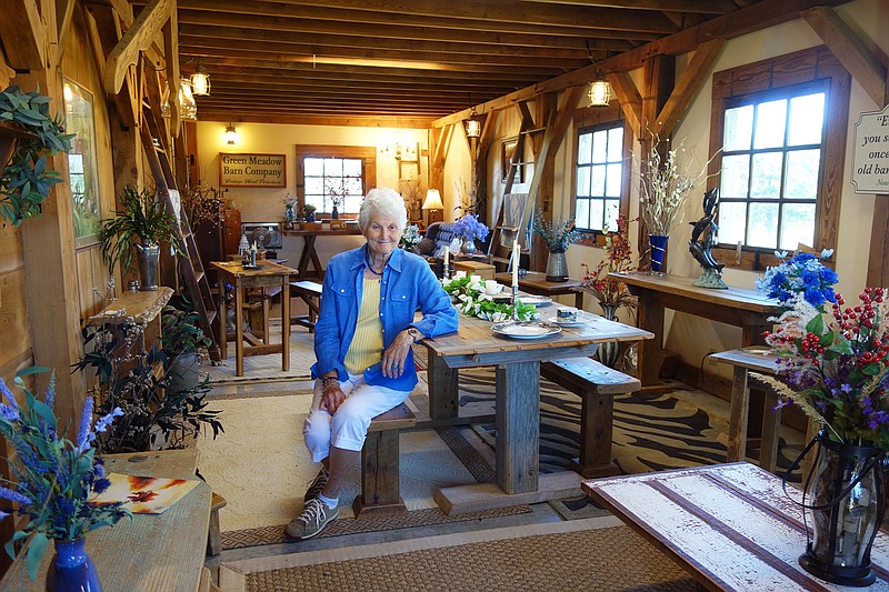 Carolyn Linton owns and operates Green Meadow Barn Company. Operating out of her own family's barn, she crafts reclaimed barnwood into beautiful and sturdy furniture. Helen Wilbers/FULTON SUN                 