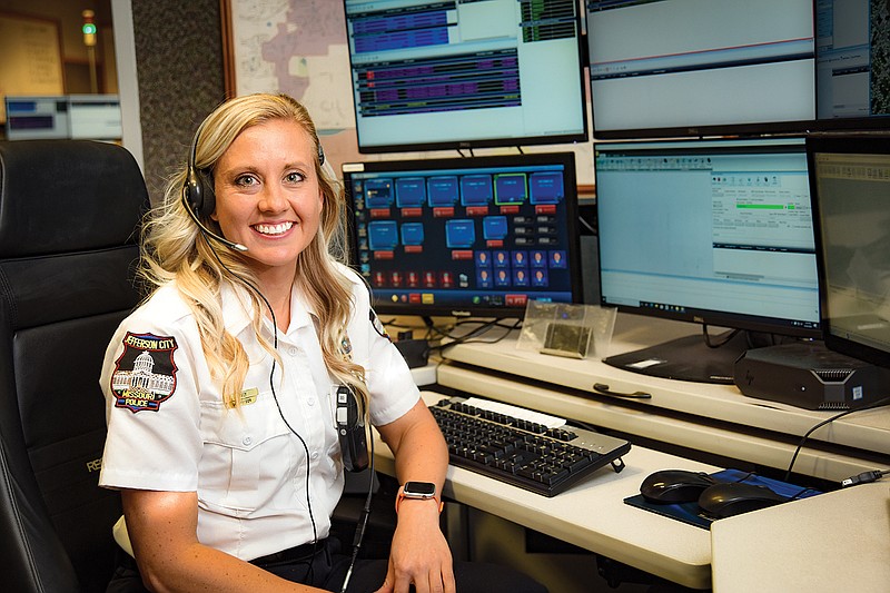 Rachel Irey poses at the command center where she serves as communications supervisor. The department is located inside the Jefferson City Police Department.