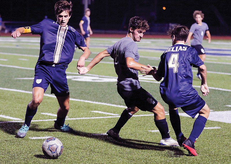 Helias midfielder Luke Hynes goes for the ball during a Jamboree last week against Capital City at Ray Hentges Stadium.