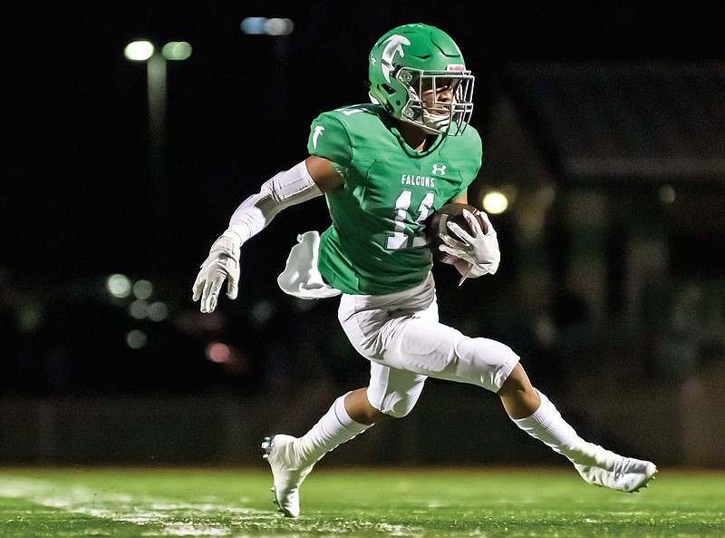 Blair Oaks wide receiver Cobi Marble looks for room to run after making a catch during last season's Class 3 District 5 opener against St. James at the Falcon Athletic Complex in Wardsville.