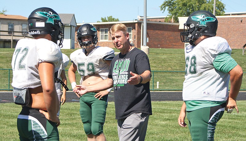 North Callaway head coach Don Boulware talks to a group of offensive linemen during an Aug. 20 practice at the high school in Kingdom City.