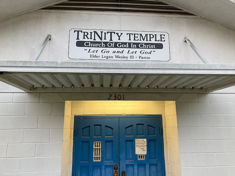 The sign on the front of Trinity Temple Church of God in Christ continues to identify convicted child sexual abuser Logan Wesley III as elder and pastor.