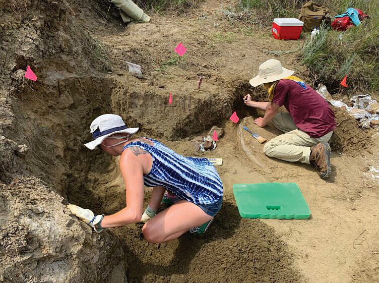 Westminster College students Sophia Hessenkemper, left, and Tim Burridge along with professor Dr. David Schmidt will discuss the triceratops skull their group found in South Dakota.