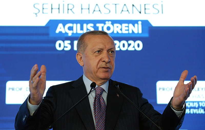 Turkey's President Recep Tayyip Erdogan speaks at a hospital's opening ceremony, in Istanbul, Saturday, Sept. 5, 2020. Erdogan on Saturday warned Greece to enter talks over disputed eastern Mediterranean territorial claims or face the consequences. "They're either going to understand the language of politics and diplomacy, or in the field with painful experiences," he said. (Turkish Presidency via AP, Pool)