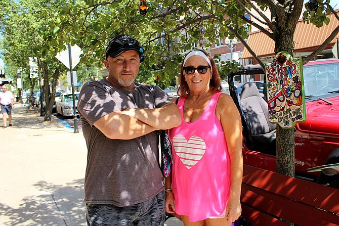 Mike Crowley and Jennifer Rosas pose for a photo. 