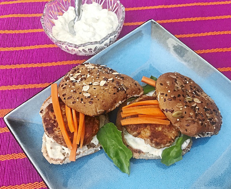 Buffalo chicken sliders with blue cheese sauce are served on a multigrain bun. (Arthi Subramaniam/Pittsburgh Post-Gazette/TNS)