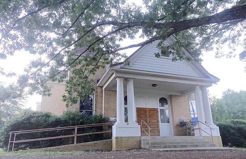 Douglassville Methodist Church members arrive regularly each Sunday for services at the 164-year-old church that had been rebuilt in 1908 and remodeled in 1949. Underneath a huge white oak tree which is exceedingly welcoming and appreciated is the distinctive Douglassville United Methodist Church entryway.
