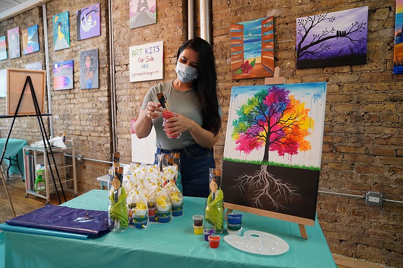 Lily Miteva of Sip and Paint Chicago is preparing for customers and packing art kits for online classes, Friday, Aug. 28, 2020. (E. Jason Wambsgans/Chicago Tribune/TNS)