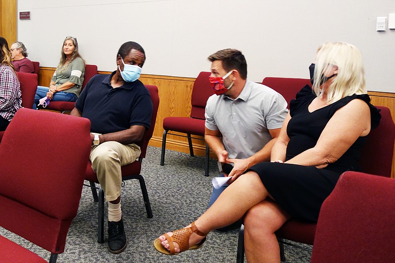 <p>Helen Wilbers/For the News Tribune</p><p>A number of firework sales tent operators spoke against a proposed firework ban during the Fulton City Council meeting Tuesday, Sept. 8, 2020. Those pictured include Mike Gardner, left, Dava Gardner, Charles Galbreath (who did not speak), Ben Muzzey and Susan Peterson, Galbreath’s business partner.</p>