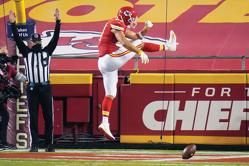 Chiefs tight end Travis Kelce celebrates after catching a touchdown pass in the first half of Thursday night's game against the Texans at Arrowhead Stadium.