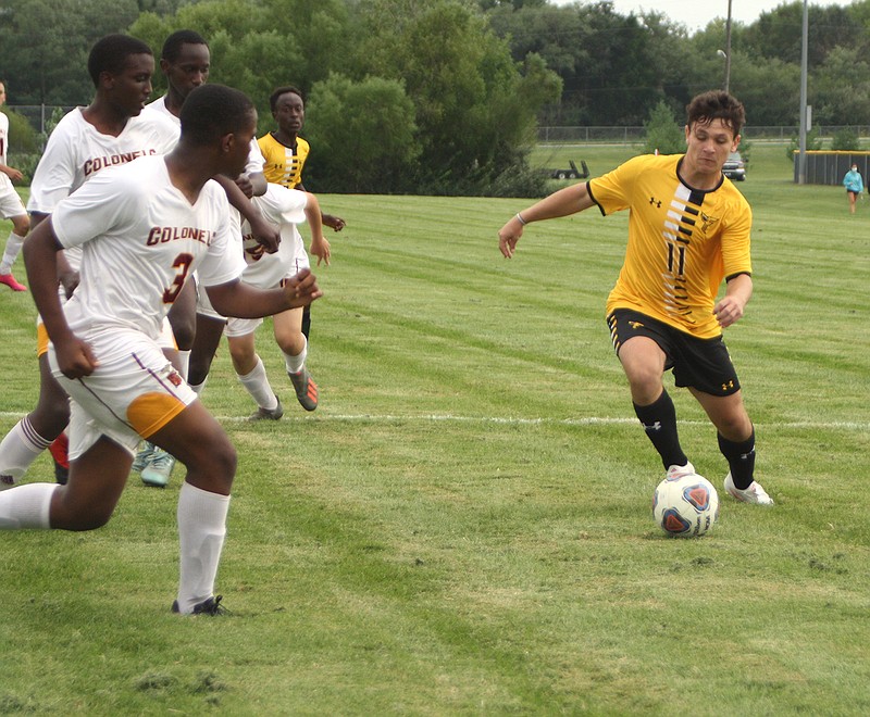 Fulton freshman midfielder Jayden Ayers controls the ball just before supplying the Hornets' first goal in the 3rd minute of the first half in a 3-1 win over the Missouri Military Academy on Thursday night at the high school athletic complex.