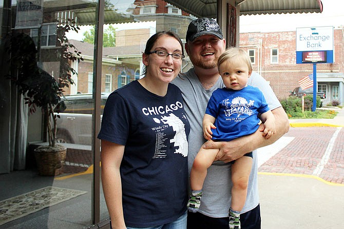 Kim, Beau and Edley Kirkpatrick pose Friday for a photo in Fulton.