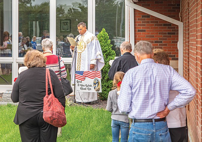 Father Anthony Viviano leads a memorial service Saturday, Sept. 12, 2021, at St. Andrew Catholic Church in Holts Summit for the National Day of Remembrance for Aborted Children. 