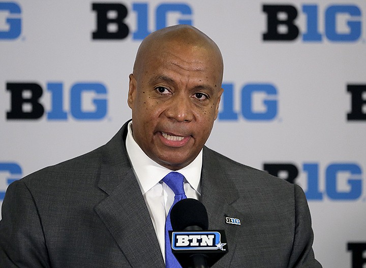 In this June 4, 2019, file photo, Kevin Warren talks to reporters after being named Big Ten Conference Commissioner during a news conference in Rosemont, Ill. Leaders of six state legislatures in the Big Ten footprint have sent a letter to commissioner Kevin Warren asking the conference to reconsider its decision to cancel the  fall football season. The letter is written on the letterhead of Michigan House speaker Lee Chatfield and also signed by statehouse leaders from Iowa, Minnesota, Ohio, Wisconsin and Pennsylvania. (AP Photo/Charles Rex Arbogast, File)