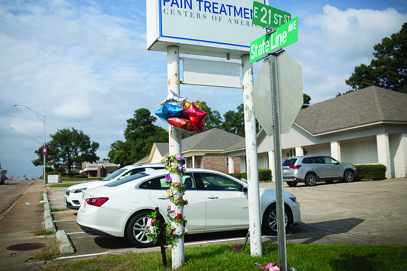 A memorial of flowers and balloons was set up following last week's motorcycle accident at  State Line Avenue and 21st Stree that resulted in the death of Scott Storey, 45, of Texarkana, Arkansas