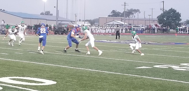 <p>Democrat photo/Kevin Labotka</p><p>Drake Schlup gains some yards Sept. 11 during the Pintos’ game against Blair Oaks.</p>