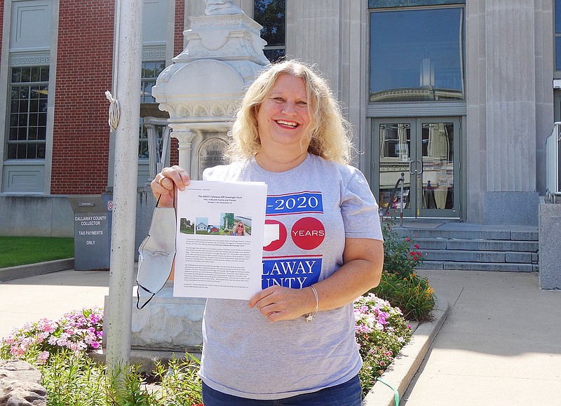 Callaway 200 Scavenger Hunt organizer Kelly Borman smiles outside one of the most well-known stops on the hunt: the Callaway County Courthouse. The scavenger hunt officially begins Oct. 1 and ends Nov. 13.