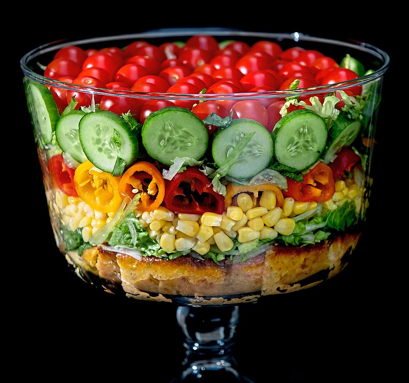 Built on a layer of savory cornbread, the summer trifle salad is made with shredded romaine lettuce, sweet corn, mini peppers, cucumbers and cherry tomatoes. Shot in Oakmont, Pennsylvania on Friday, August 21, 2020. (Steve Mellon/Pittsburgh Post-Gazette/TNS)