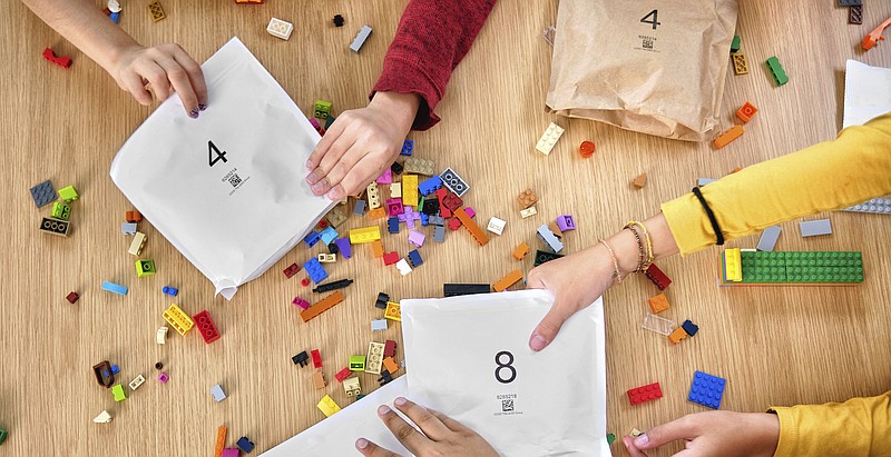 In an image provided by Lego, colorful toy Lego bricks are seen. Lego said Tuesday, Sept. 15, 2020, that it will stop using plastic bags inside its boxed sets and replace them with paper ones. (Allan Ringgaard/Courtesy of Lego via AP)