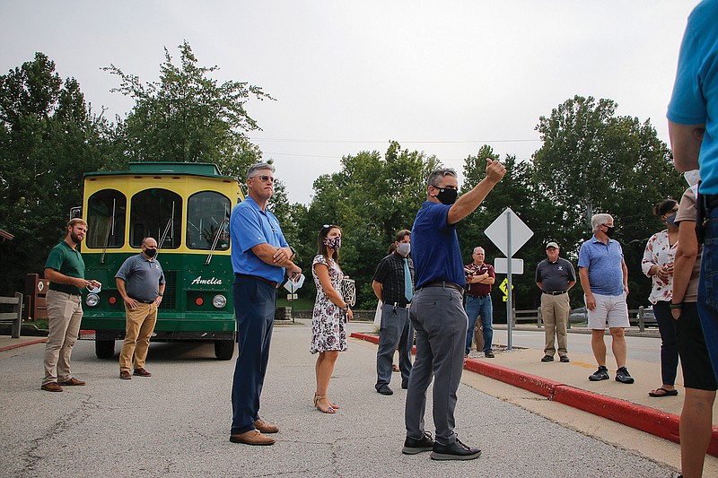 Parks Department Director Todd Spalding, center, points out areas of Washington Park that will be revamped in future months during the Jefferson City Parks and Recreation Commission's annual parks tour Tuesday. The commission visited four parks, with some members riding on a trolley to get from place to place. Among the improvements to Washington Park will be better lighting for part of Kansas Street so drivers can better see pedestrians at night.