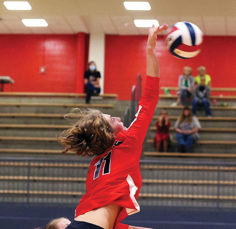 Jefferson City's Claire Stegeman spikes the ball during Tuesday night's match against Rolla at Fleming Fieldhouse.