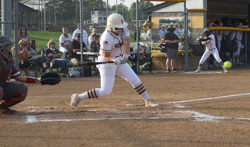 Fulton senior first baseman Paige Clines singles in the bottom of the first inning of the Lady Hornets' 6-1 NCMC loss to the rival Mexico Lady Bulldogs on Thursday night at the high school athletic complex.