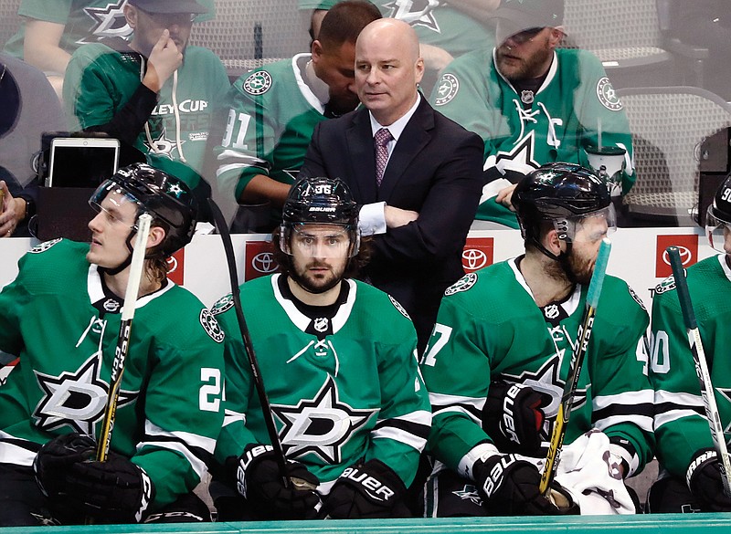 In this April 17, 2019, file photo, Stars coach Jim Montgomery watches play during a game with the Predators in Dallas.