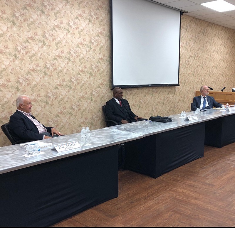 From left, Dr. Mike Moses, former commissioner of Education; Dr. Alfred Ray, retired Texas superintendent; and David Thompson, an education law attorney speak at a press conference in Texarkana on Thursday afternoon.