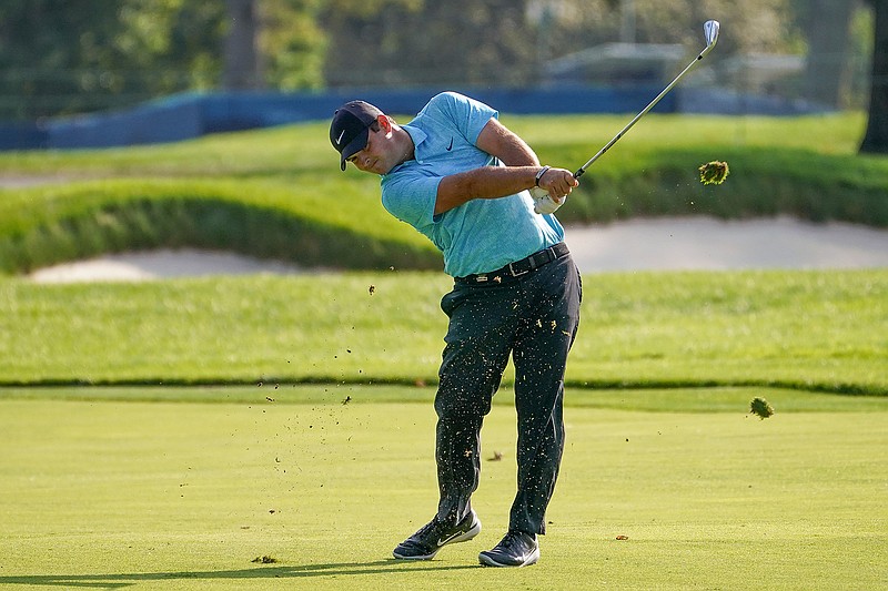 Patrick Reed, of the United States, plays a shot off the second fairway during the second round of the US Open Golf Championship, Friday, Sept. 18, 2020, in Mamaroneck, N.Y. (AP Photo/John Minchillo)