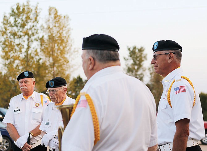 Members of the Post 1003 Honor Guard gather Friday after giving a rifle salute to those lost to war at the POW/MIA Recognition Ceremony at the VFW Post 1003 in St. Martin.