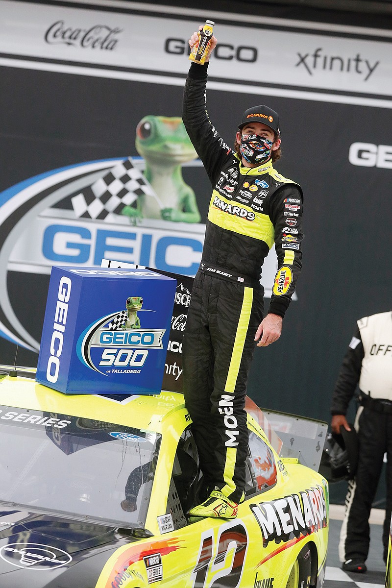 In this June 22 file photo, Ryan Blaney celebrates after winning a NASCAR Cup Series race at Talladega Superspeedway in Talladega Ala.