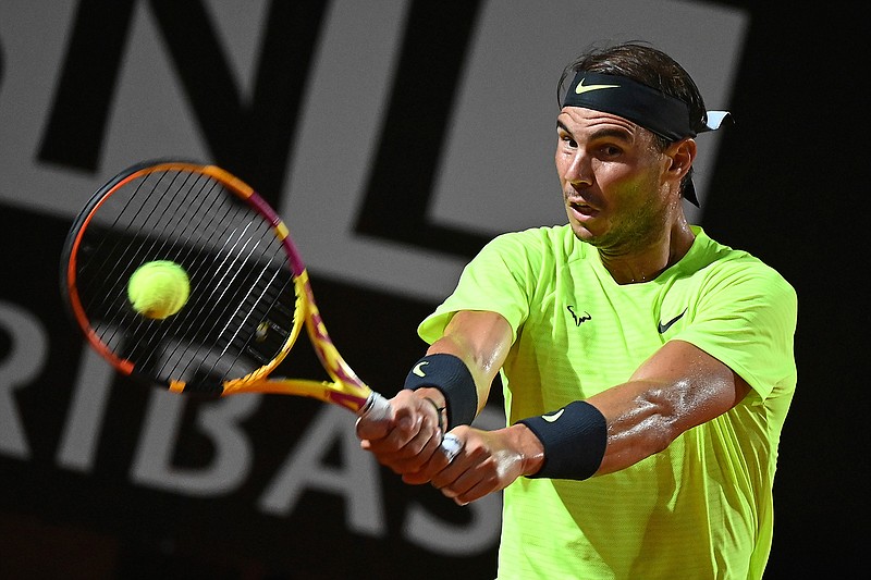 Spain's Rafael Nadal returns the ball to Argentina's Diego Schwartzman during their quarterfinals at the Italian Open tennis tournament, in Rome, Saturday, Sept. 19, 2020. (Alfredo Falcone/LaPresse via AP)