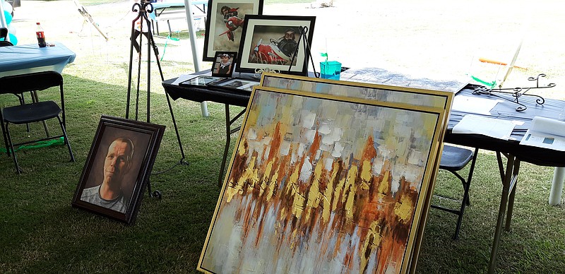 Artworks from local artists were among items up for grabs at a silent auction that raised funds for Just Love and Kindness' first charity event for the Texarkana Arkansas Police Department. This event, held Saturday at the Texarkana Golf Ranch, was the group's first annual fundraise