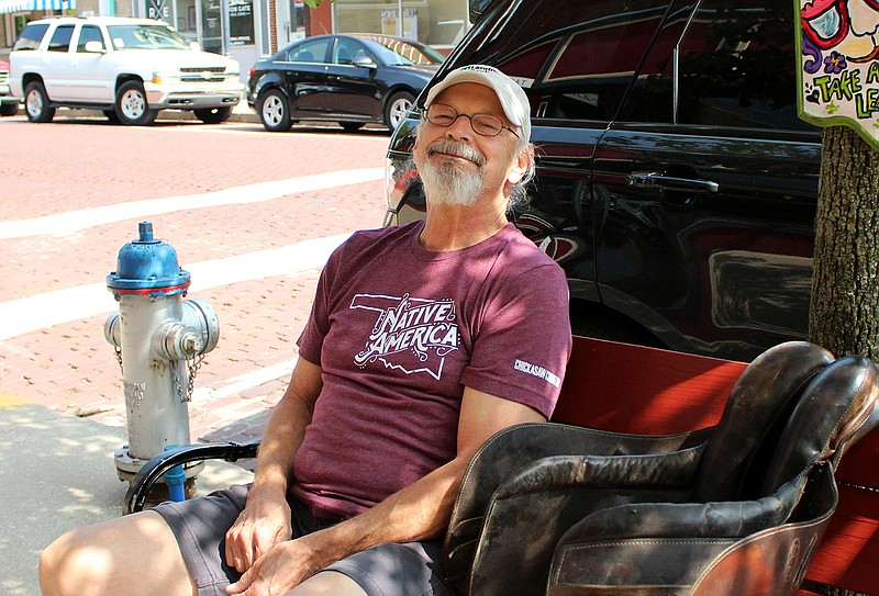 Rusty Gowin poses for a photo Friday in towntown Fulton. Gowin is a self-proclaimed "jack of all trades."